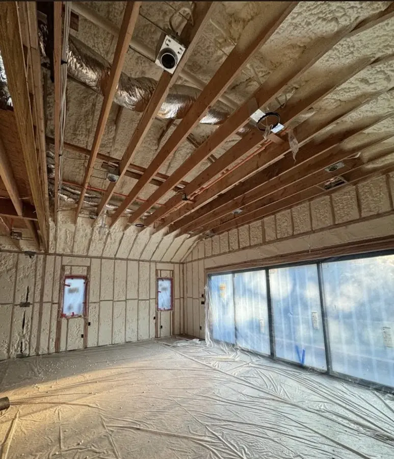 Interior walls and ceiling insulated with spray foam during new construction in Steele Creek